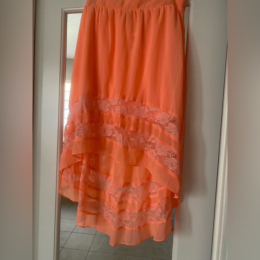 Asymmetrical bright orange skirt with some lace. Size XL